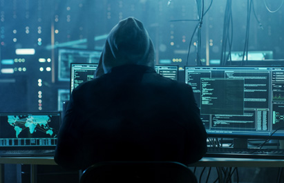 Hacker at computer